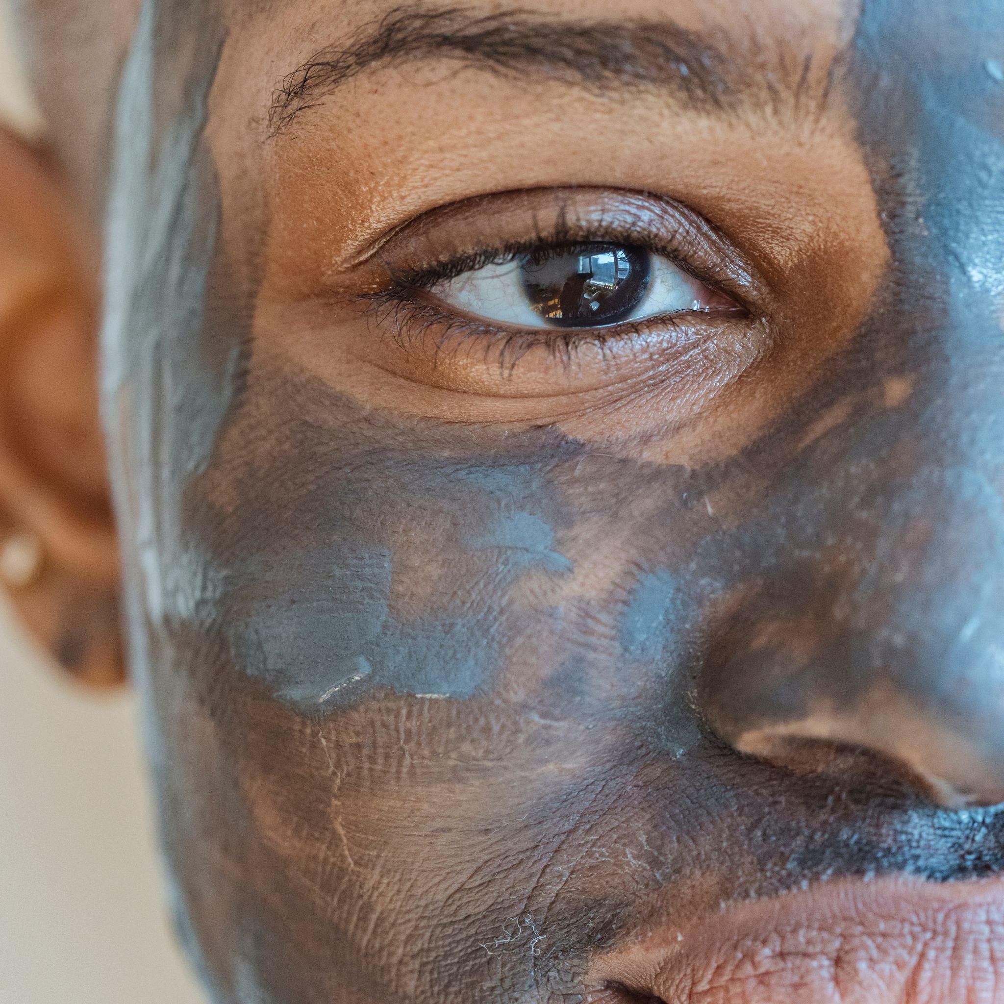 the dead sea co mud mask. Lady wearing the dead sea co mud mask