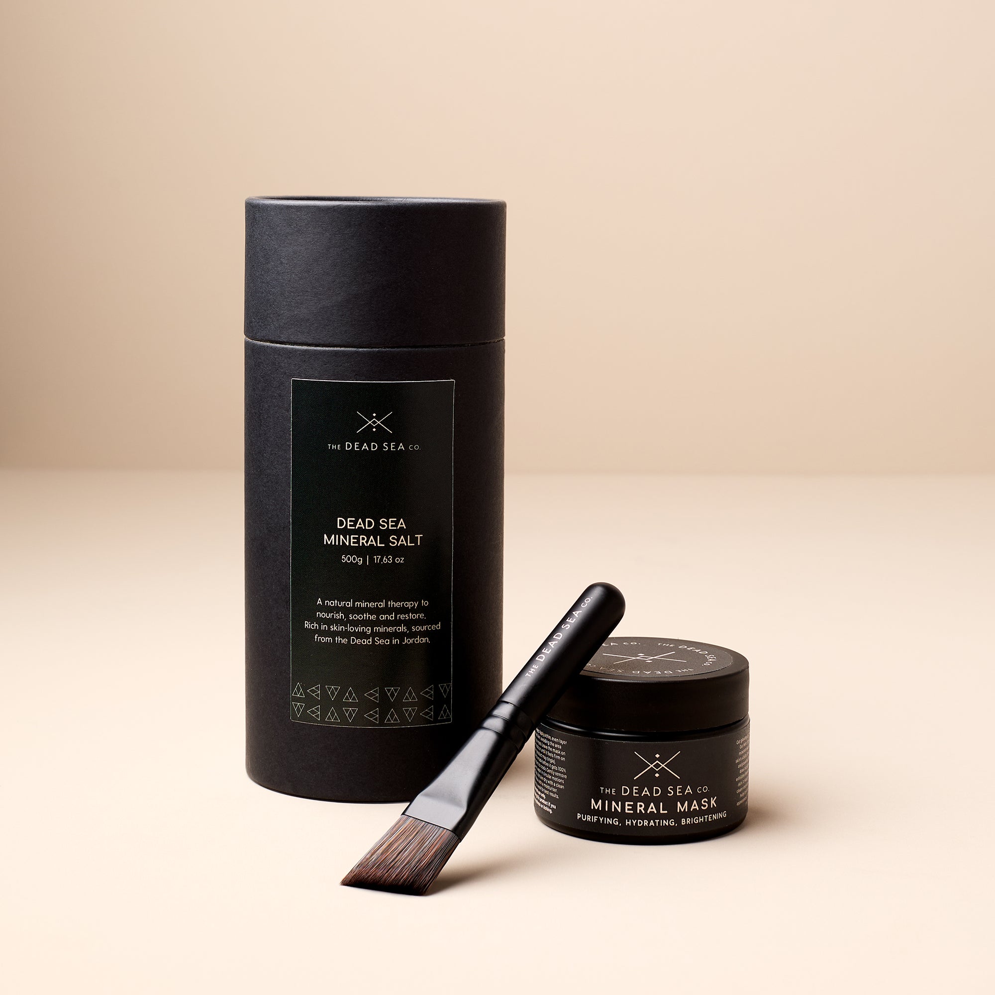The Dead Sea Co. Mineral Ritual Spa Set featuring 500g Dead Sea mineral salt, mineral mud mask, and luxury application brush—natural skincare for detox, hydration, and holistic wellness.