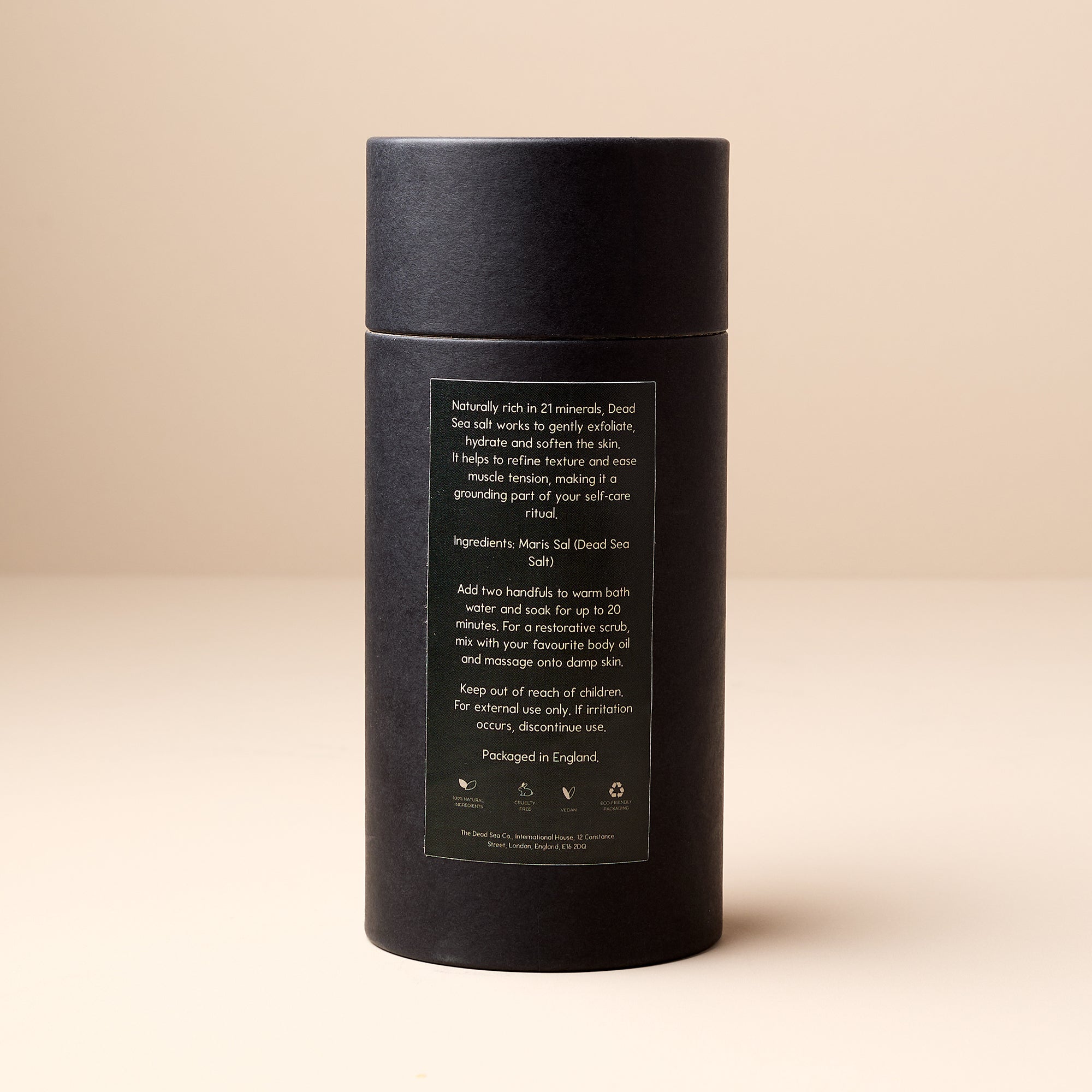 Back view of The Dead Sea Co. Dead Sea Mineral Salt packaging, showing product usage instructions and ingredient list.