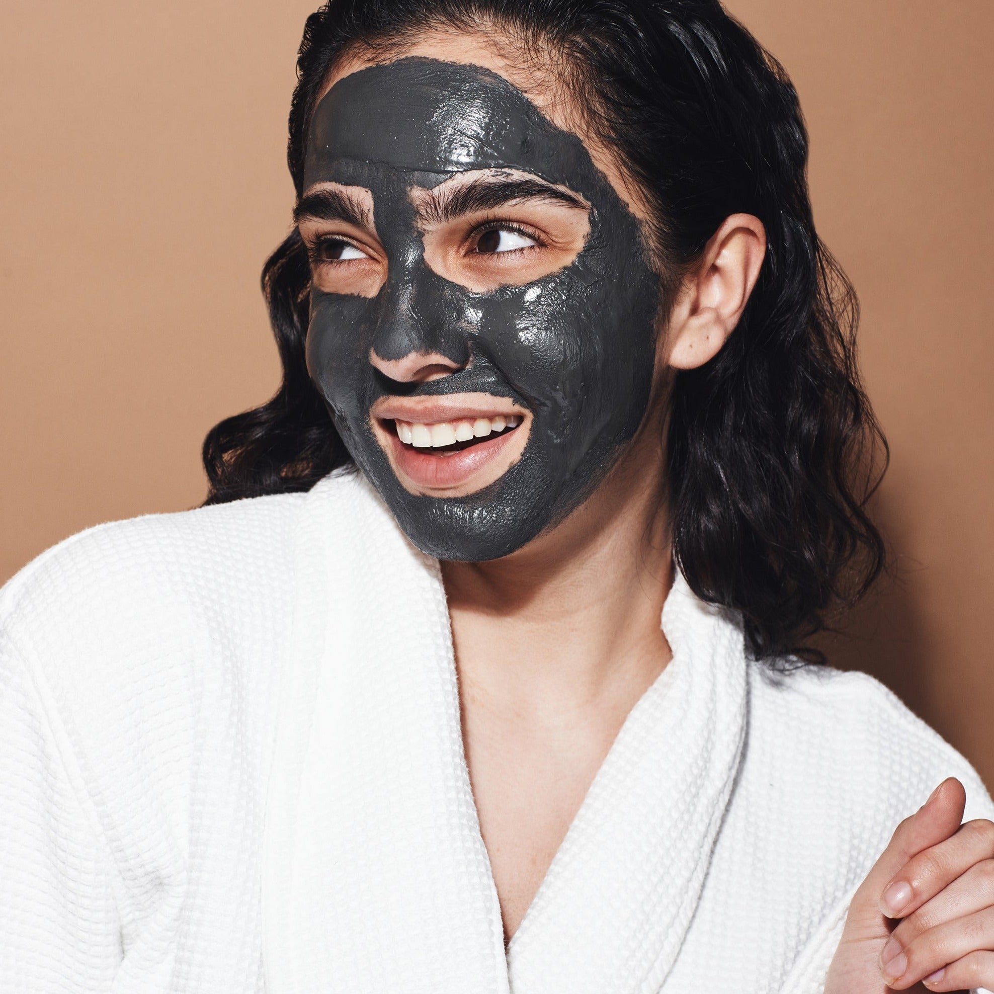 Spa day at home: Woman enjoying The Dead Sea Co's Mineral Mask .