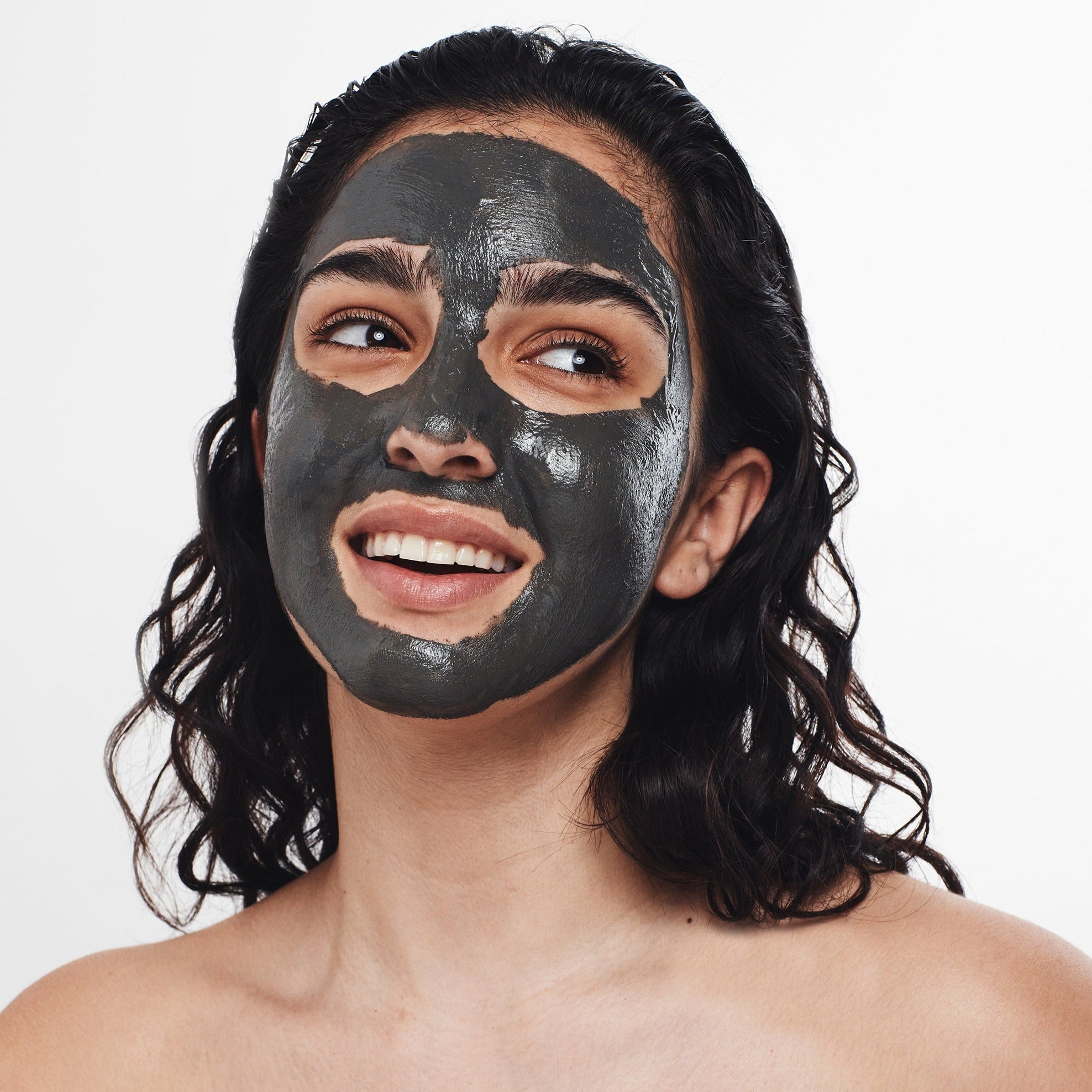 Woman using The Dead Sea Co.'s Dead Sea face mask